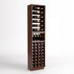 Tall wood wine rack cabinet with top bottle rails, glass tray, and front cellar bottle rows