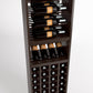 Wood wine rack cabinet front view with slanted bottle holders, shelf bottles, and bottom cubby rows