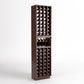 Dark wood wine cellar rack with four-column bottle slots and a small bottle tray