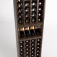 Close-up front of a wood wine rack showing bottle slots, a wine bottle tray, and lower cubbies