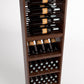 Wooden wine rack unit with four bottle rails and two lower rows of bottle storage