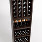 Walnut-toned wine bottle rack with bottle cubbies and three front storage bins
