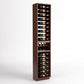 Tall wooden wine display cabinet with four bottle rails and a bottom wine bottle tray