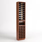 Tall wooden wine rack with 4 columns, bottle holders, and lower wine cubby openings