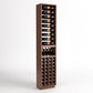 Narrow wine display rack with 4-column storage, bottle shelf, and cork bottle cubby grid