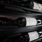 Wine bottles in a rack cradle with labels facing outward for easy viewing.