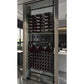 Built-in wine bottle storage cabinet with dark-framed tiers and bottled labels on racks.