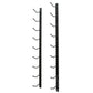 Black wall wine bottle rack with two vertical rails and curved bottle holders