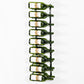 Wall-mounted bottle rack holding green wine bottles with white labels, metal hooks