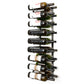 Wall-mounted wine bottle rack with black metal rails holding dark glass bottles