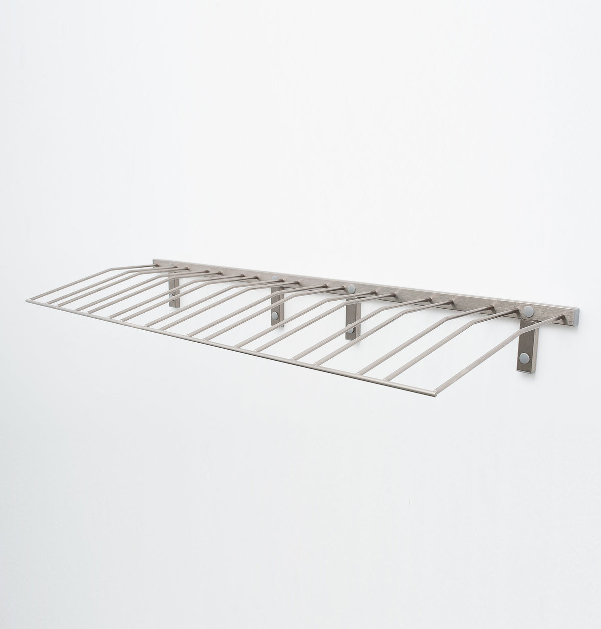 Wine bottle wall rack with light metal finish and slanted wire bottle holders