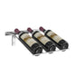 Wall-mounted wine bottle rack holding three dark bottles with burgundy corks.