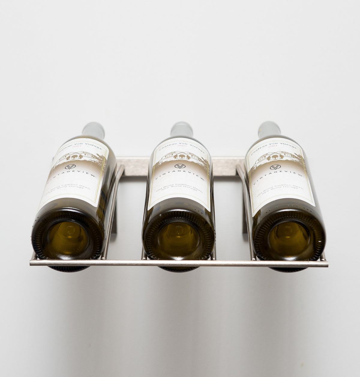 Wall-mounted wine bottle rack holding 3 bottles, front view with upright bottle openings