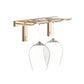 Gold-tone wall-mounted stemware rack with hooks holding wine glasses