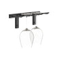 Black wall-mounted stemware rack with hooks holding wine glasses
