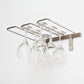 Silver-tone wall-mounted stemware rack holding five wine glasses