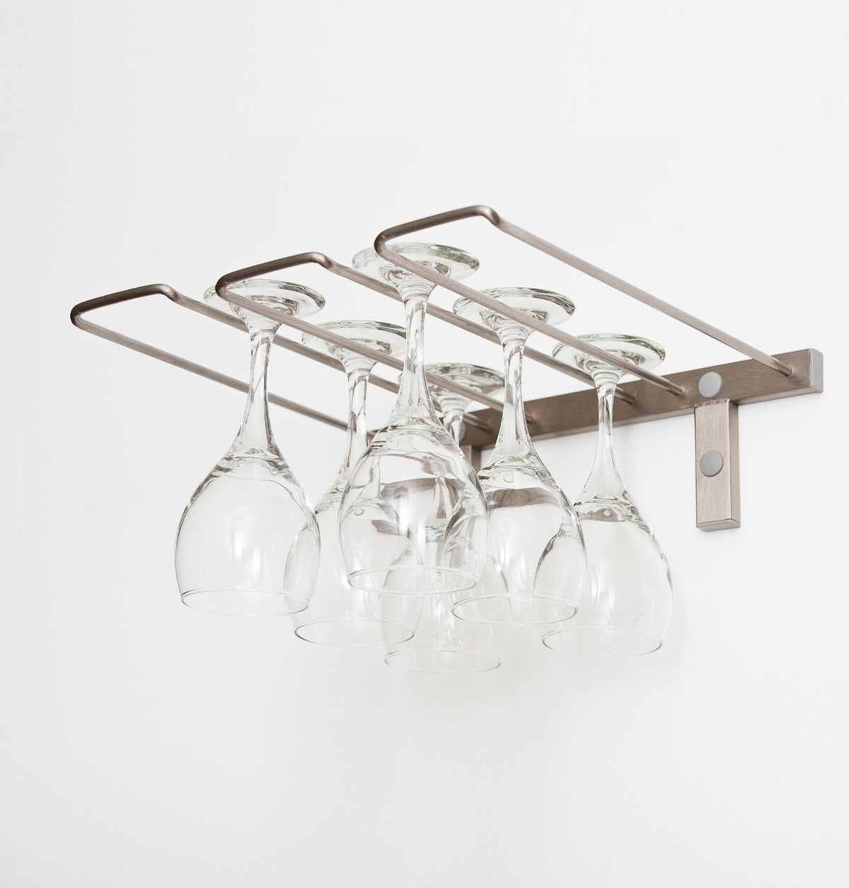 Silver-tone wall-mounted stemware rack holding five wine glasses