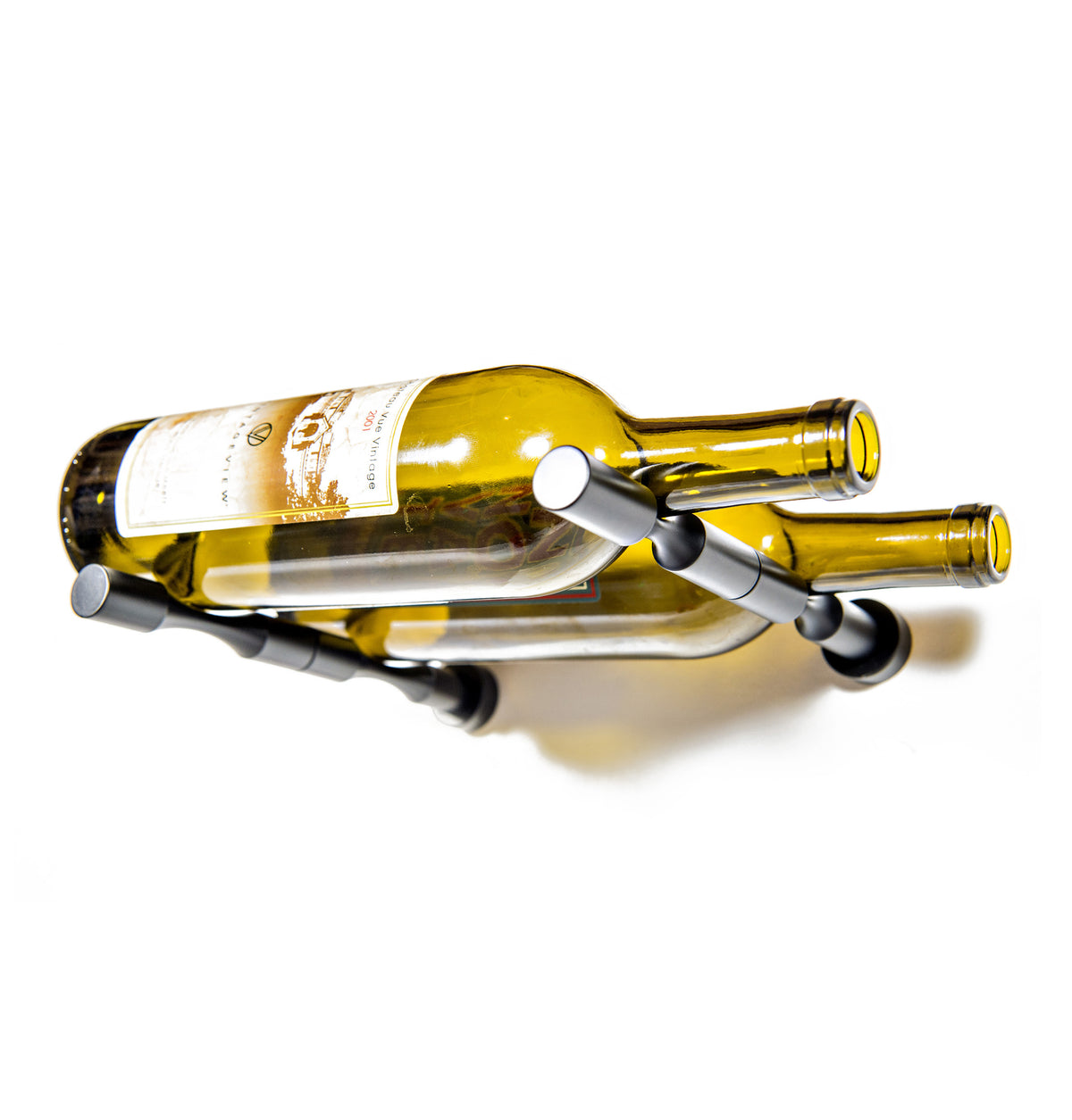 Metal bottle pin set holding two bottles; round plates and curved bottle rests visible