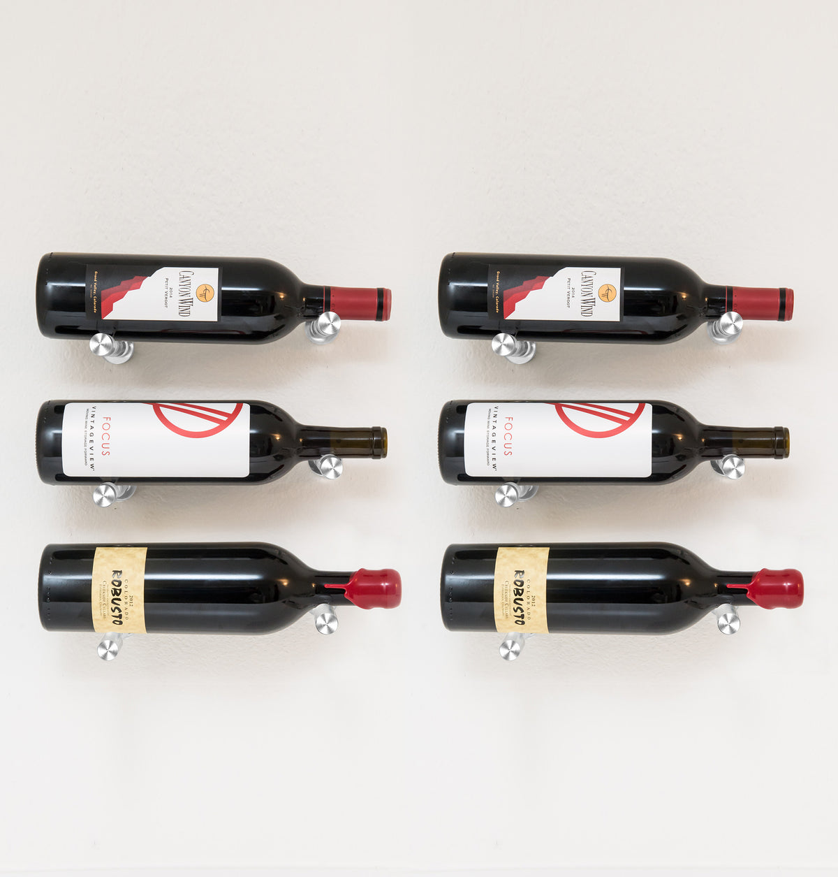 Set of 6 black wine bottle pin holders with angled red caps and metal display pins