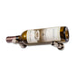 Wine bottle display pin with golden bronze finish holding an amber bottle close-up