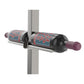 Double-sided bottle holder bar with black rails and bronze bracket, purple-cork bottles