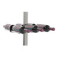 Double-sided bottle holder bar with black rails holding wine bottles with purple corks