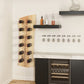 Wine rail display wall with bottle holders and empty glass storage rack