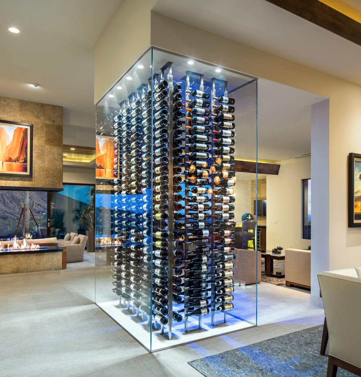 Glass-enclosed wall wine rack with black frame and rows of wine bottles