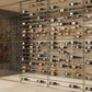 6 ft wine tower display rack with clear frame and many bottles on black rails