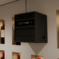 Wall-mounted through-wall wine cellar cooling system with grille and temperature screen