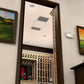 Ceiling-mounted ductless wine cooling system with vent panels in a wine cellar