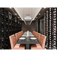 Wine storage walls with bottle racks, multiple rows of wine bottles displayed.