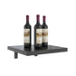 Wall wine shelf with three wine bottles on a dark rectangular shelf platform