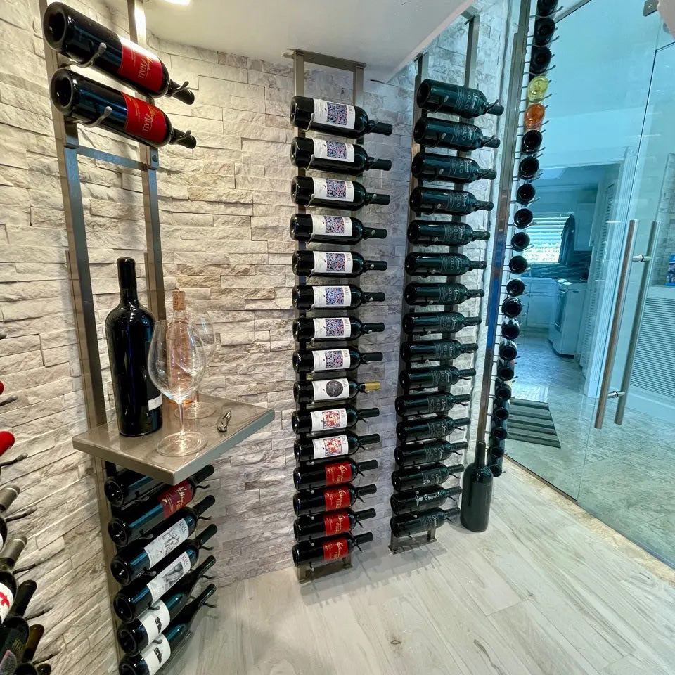 Wall-mounted metal wine shelf with bottle slots, dark frame and glass bottle displays