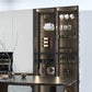 Wall wine rack with open shelving and bottle holders in a cabinet
