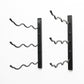 Wall-mount wine rack with matte black frame and curved bottle pegs