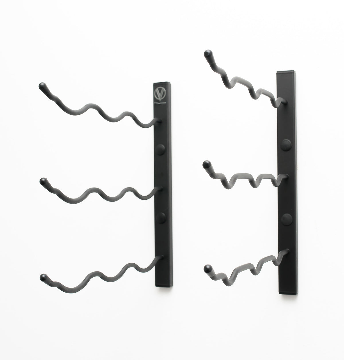 Wall-mount wine rack with matte black frame and curved bottle pegs