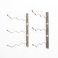 Wall-mount wine rack with two vertical bars and six curved pegs for bottles