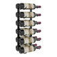 Wall-mounted wine rack holding eight wine bottles with dark frame and maroon caps