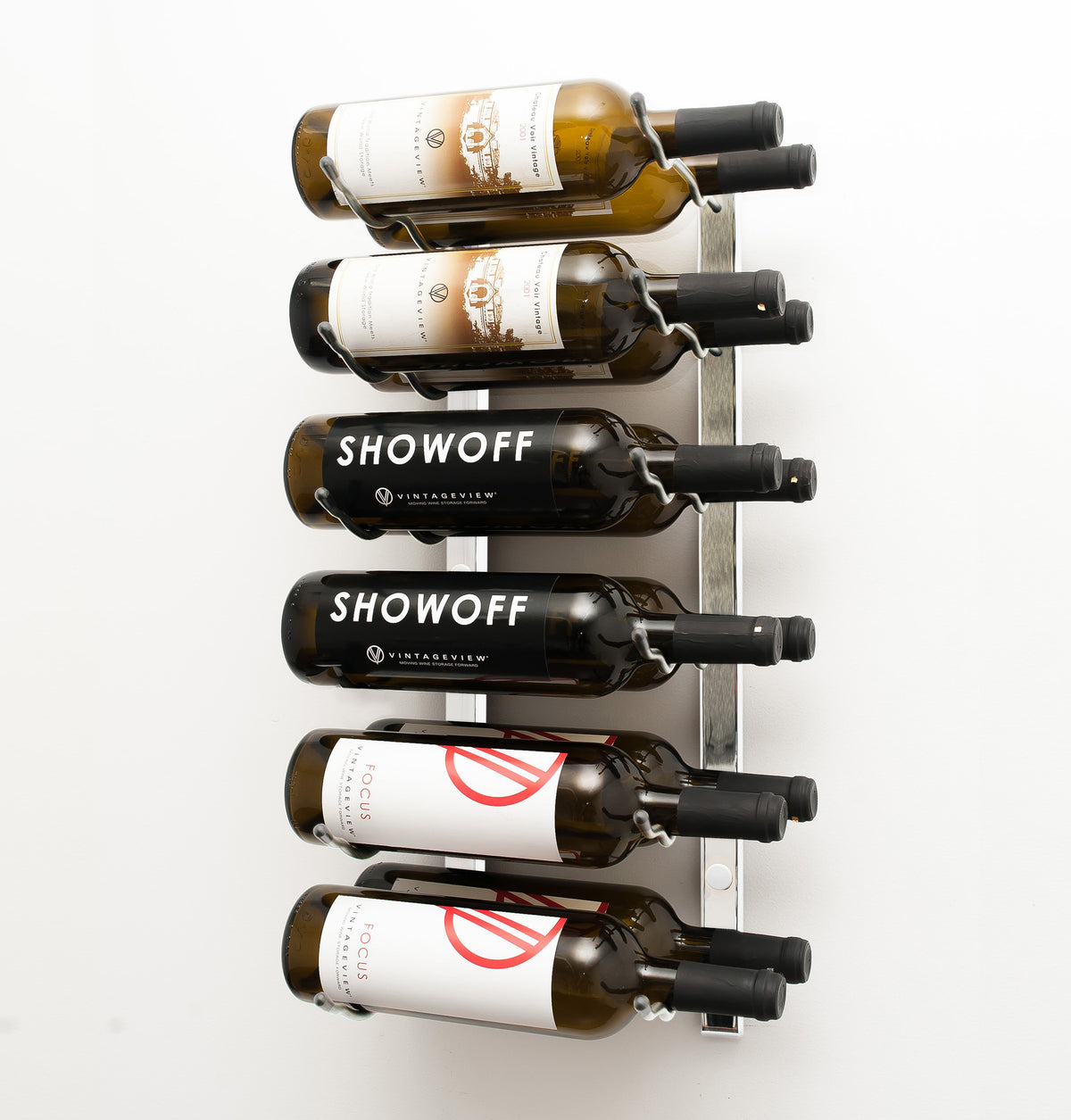 Wall wine rack with silver back plate holding six wine bottles on black pegs