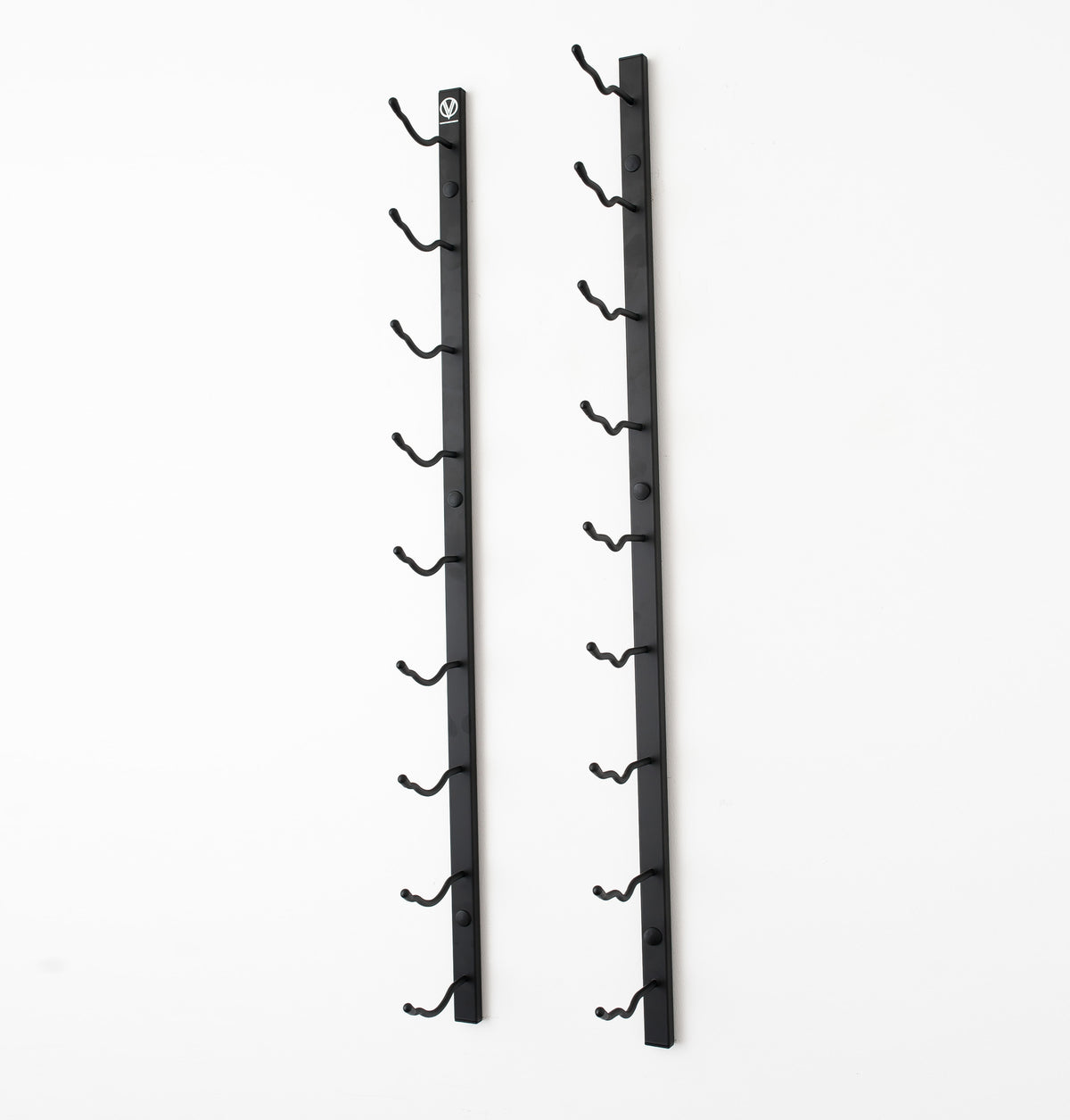 Pair of wall-mounted wine rack rails with curved bottle holders, matte black finish