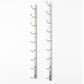 Wall-mounted wine rack with silver metal frame and curved bottle hooks
