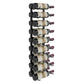 Wall-mounted wine rack with black bottle slots holding multiple wine bottles