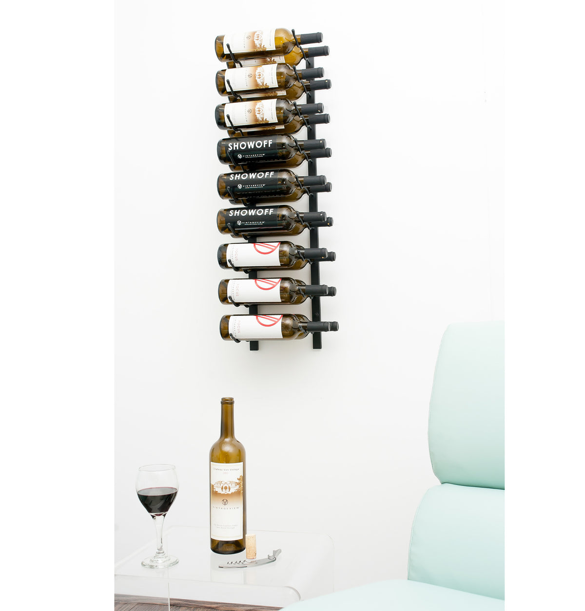 Wall-mounted matte black wine rack holding 9 wine bottles on wall