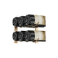 Black wall wine rack bottle holders gripping two wine bottles