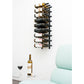 Wall-mounted black wine rack holding wine bottles in several rows.