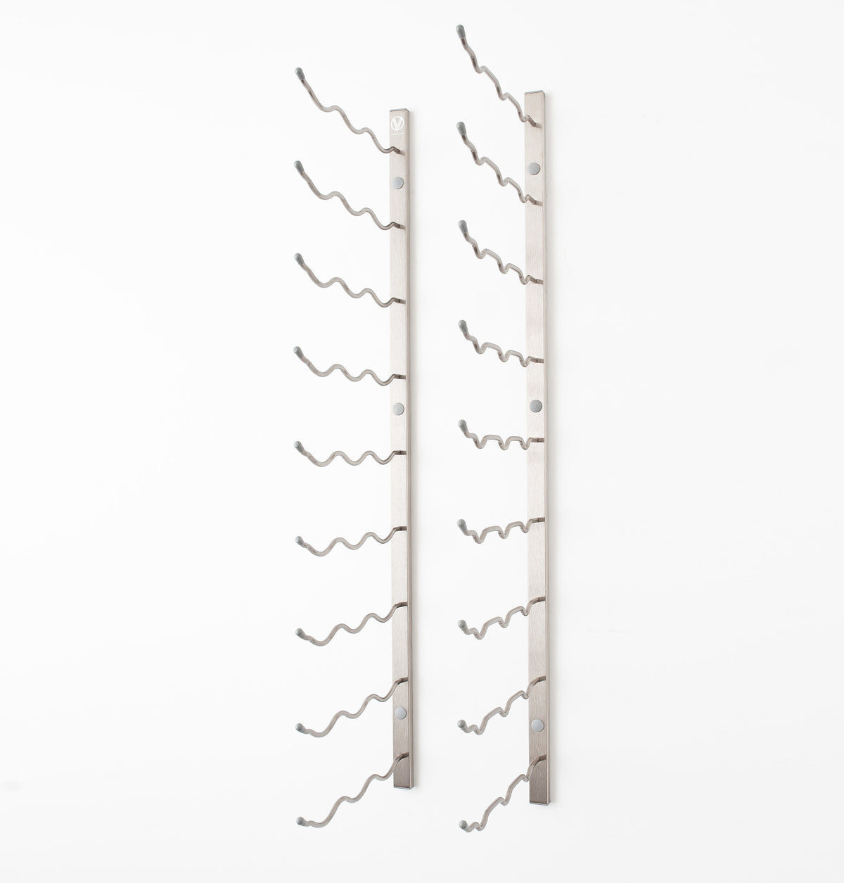 Wall-mounted light gray wine rack with curved bottle holders, empty.