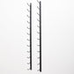 Wall-mounted wine rack with two black rails and multiple curved bottle hooks