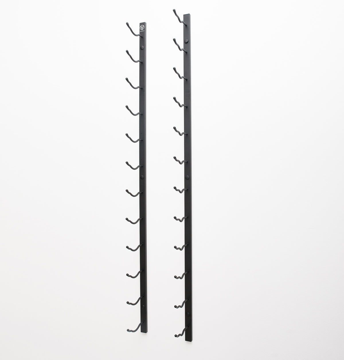 Wall-mounted wine rack with two black rails and multiple curved bottle hooks
