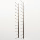 Wall-mounted wine rack with two bronze metal frames and curved bottle hooks